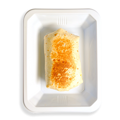 In this white container is a perfectly folded looking burrito which inside has scrambled eggs and lean ground turkey. This is a burrito in a to-go container for delivery or instore pickup for someone who is being mindful of the calories they consume but does not want eat something without flavor. A healthy prepared meal would be a good way to describe the way this burrito sits in this container.