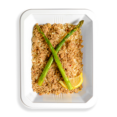A takeout container holds a serving of ground turkey over a bed of rice, topped with two asparagus stalks and a fresh lemon wedge. The meal’s presentation suggests it is a nutritious, portion-controlled option, ideal for someone focused on weight loss or muscle gain.