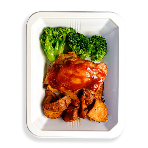 One piece of BBQ chicken, approximately three pieces of very green broccoli and many red potatoes fill this white container.  The container as a whole is a to-go meal for people who want to eat healthy but do not want to deprive themselves of flavor.
