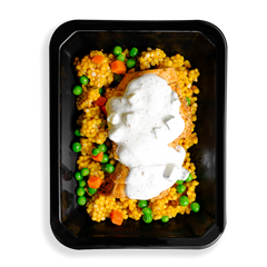 I have never seen couscous this full, chicken with a white sauce sits on top of this couscous with green peas and orange carrots filling up this togo container. the colors are vibrant and the food looks very fresh, a perfect meal for someone in a rush or having food delivered and wanting to watch what they eat while not sparing flavors.