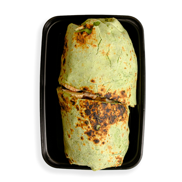 this looks like a green burrito cooked to perfection. the burrito is so big that it barely fits in the black togo container.  Its container indicates that this is a healthy prepared meal for someone on the run who wants to both watch what they eat while not depriving themselves of flavor.