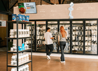 Two People in Front of Cooler