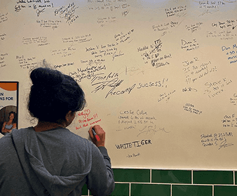Girl Writing on Whiteboard