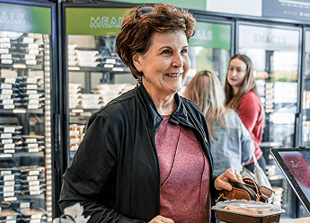 Lady Smiling at Counter