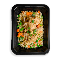 A black container is filled with a healthy version of a classic Chinese fried rice dish.  There is brown rice, chicken thigh, peas, carrots, and green onions filling this container.  The food looks very fresh and colorful.  The fact that the food is in a to-go container signals to me that this is a healthy prepared meal for delivery or pickup from a My Fit Food store location.