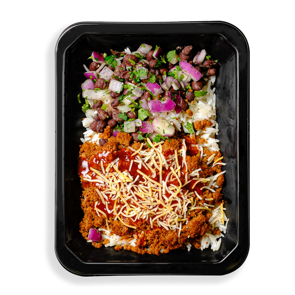 The contents of this container look like a deconstructed taco.  I see very flavorful looking ground meat with cheese, salsa, beans, cilantro and onion on top of white rice.  This meal looks extremely tasty but I notice it is lacking the cheap carbs typically of the tortilla in a taco or burrito.  Clearly the contents of this to-go container is focused on health while appearing not to lack any flavor.